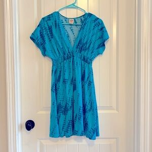 Either a dress or beach/pool cover up.